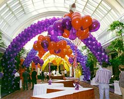 This series of packed style balloon arches are placed through the concourse at a San Francisco convention to act as visual guides between venues for convention guests