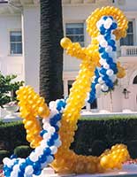 This balloon sculpture of a giant golden anchor complete with line was created as an entrance piece for a sea theme party